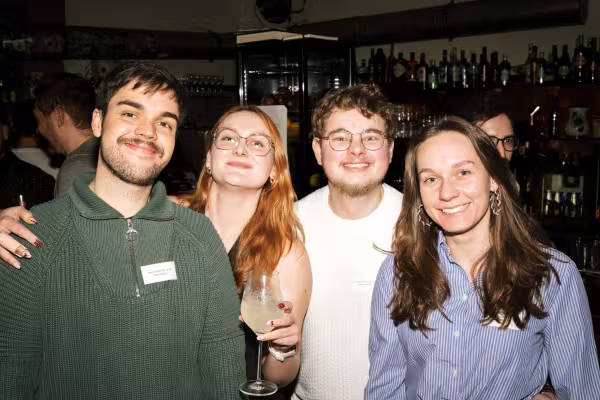 Four People looking at the camera